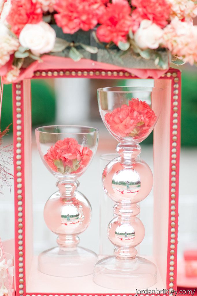 Unique centerpiece stand in red with silver nailhead trim