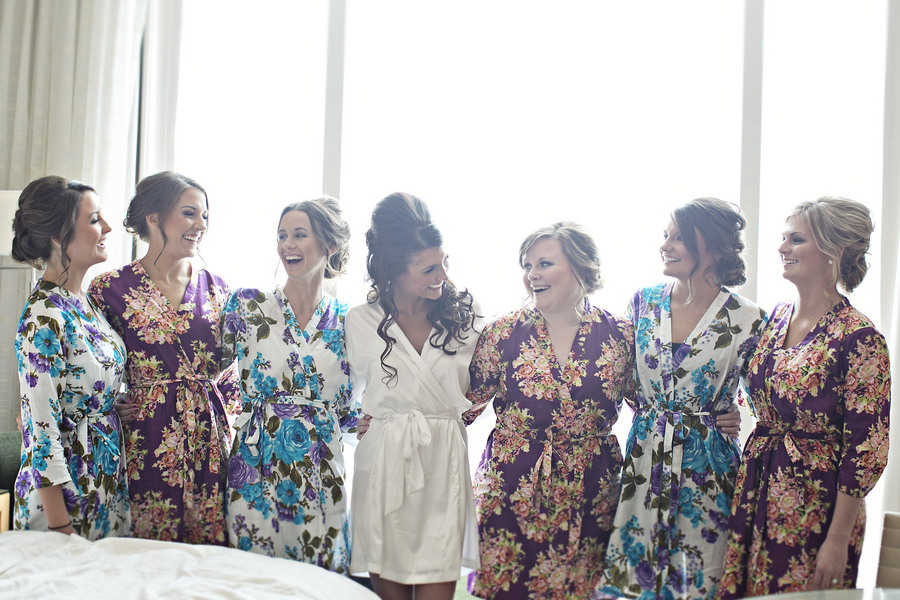 bridesmaids getting ready in floral robes four seasons hotel