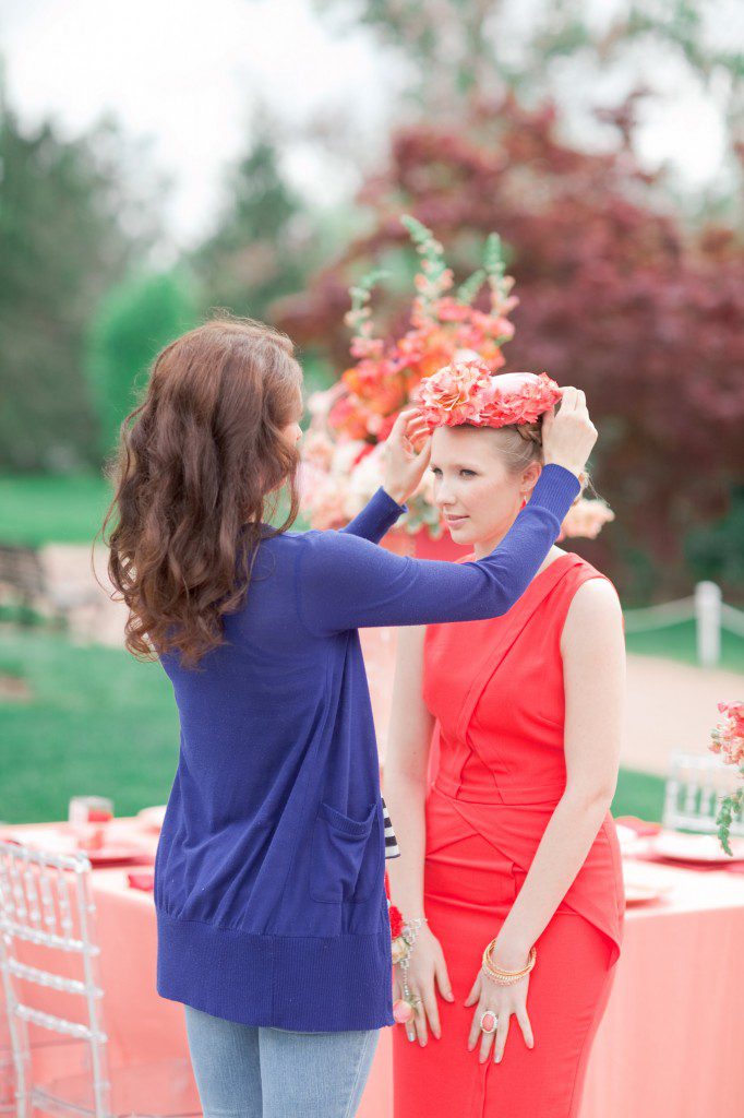 Styling a photo shoot bridesmaid with flower hat