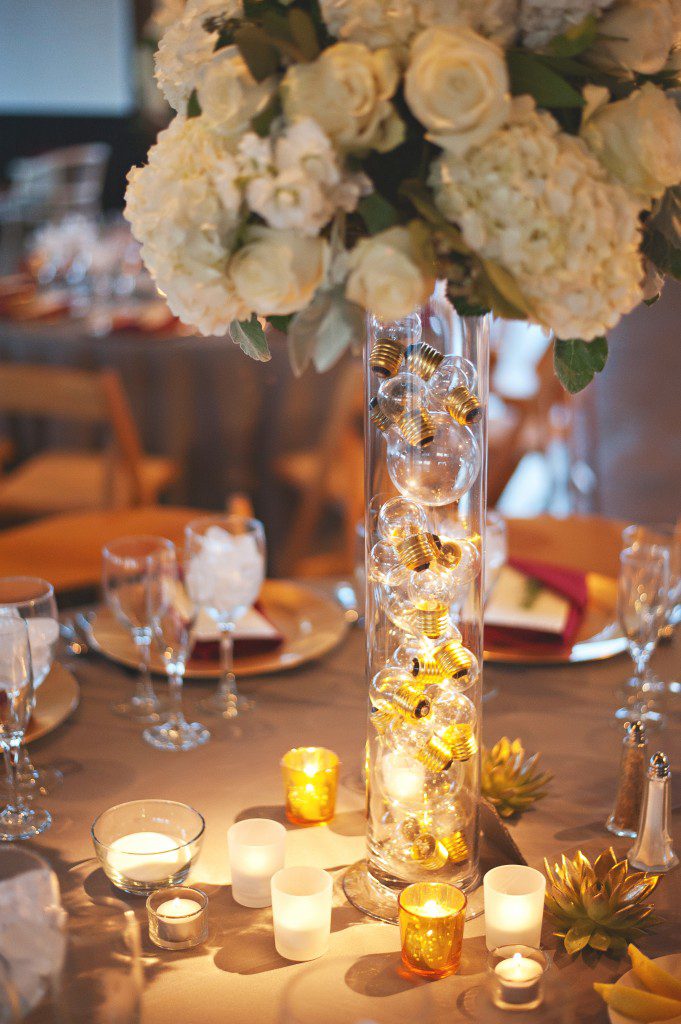 Clear vase filled with lightbulbs centerpiece 