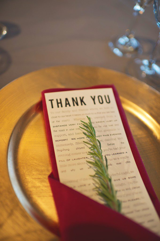 Thank You wedding napkin with rosemary on gold charger