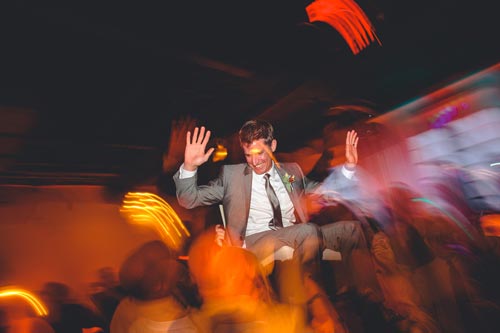 Groom chair dance at Caramel Room | Weddings by Events Luxe