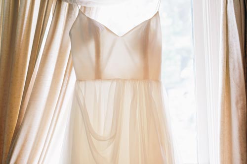 Wedding dress in window | Events Luxe Weddings